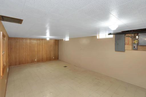 Partially finished lower level- family room area.