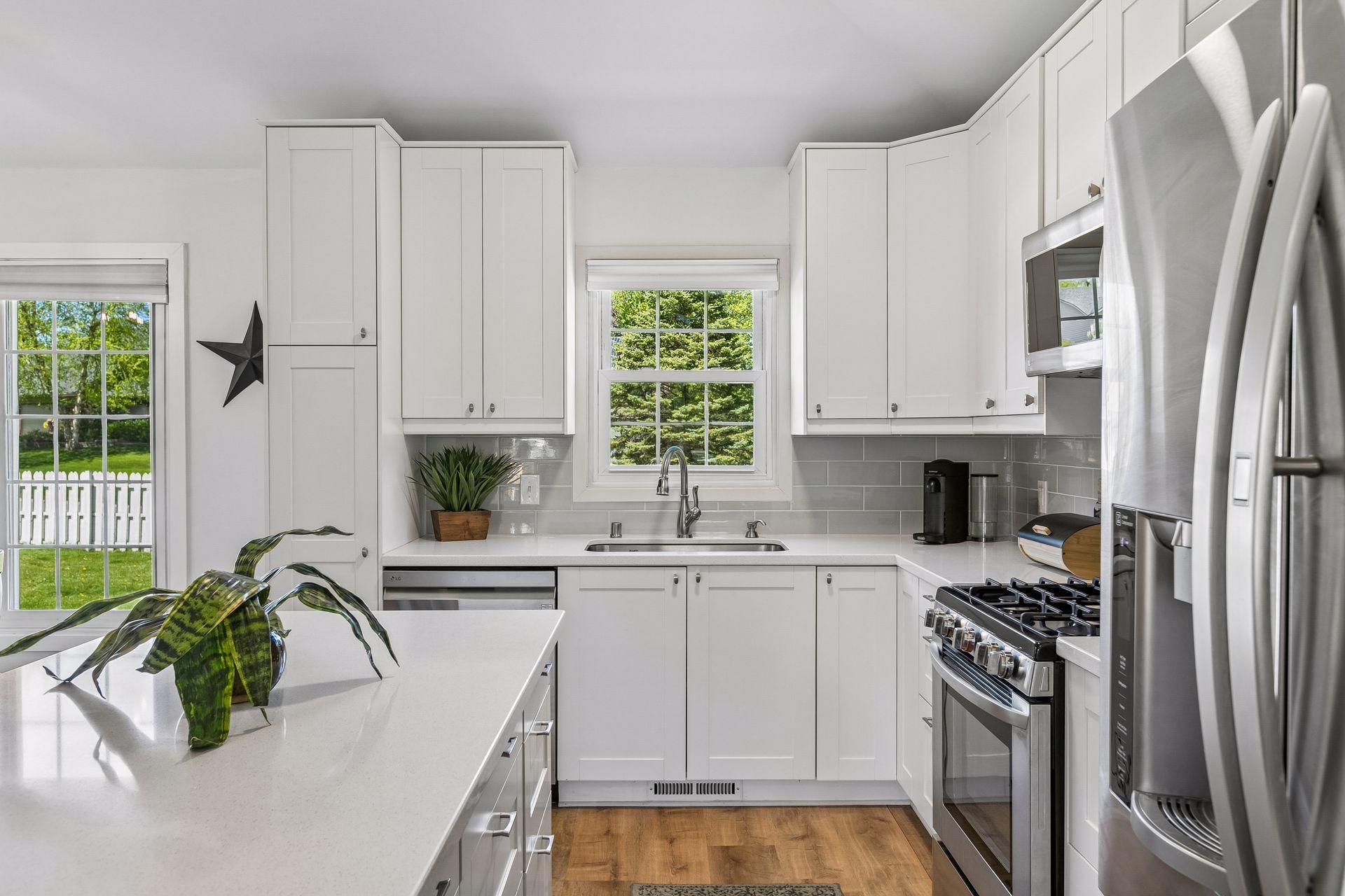 Enjoy a gas stove, built-in microwave, built-in garbage/recycling pull outs and many other thoughtful extras.