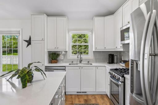 Enjoy a gas stove, built-in microwave, built-in garbage/recycling pull outs and many other thoughtful extras.