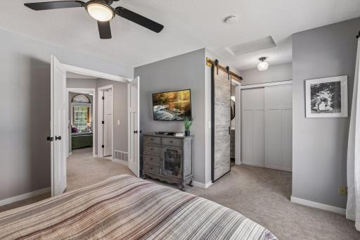 Enjoy updated paneled doors throughout the home. There is even a fun barn door into the owners bath.