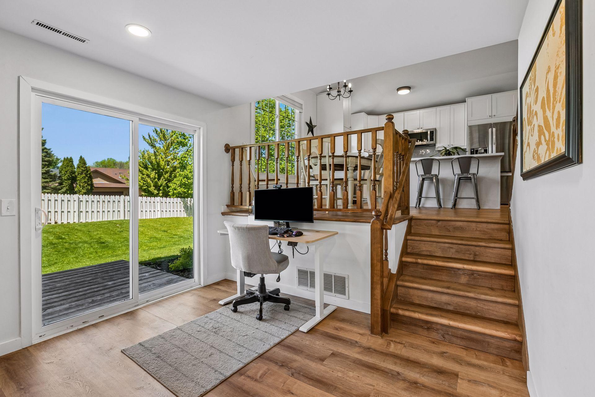 The family room is large enough to accommodate a workspace if needed.