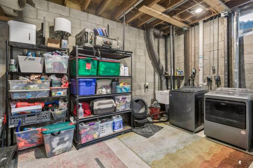 The laundry area has a handy wash tub. There is also a radon mitigation system for this space.