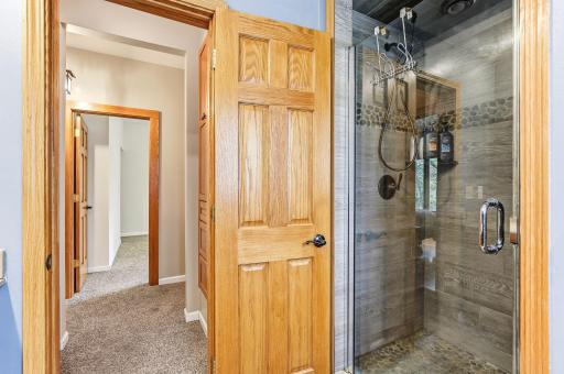 Updated tile, sleek fixtures, and a clean shower design make the space feel calm and contemporary.