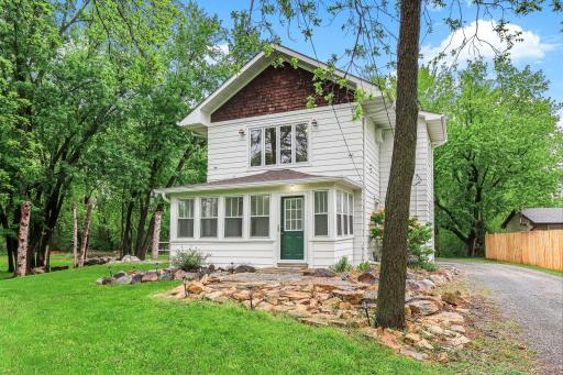 Charming farmhouse on 1.72 acres - all in the heart of the city! The property feels private and serene, with plenty of room for gardens and outdoor living.