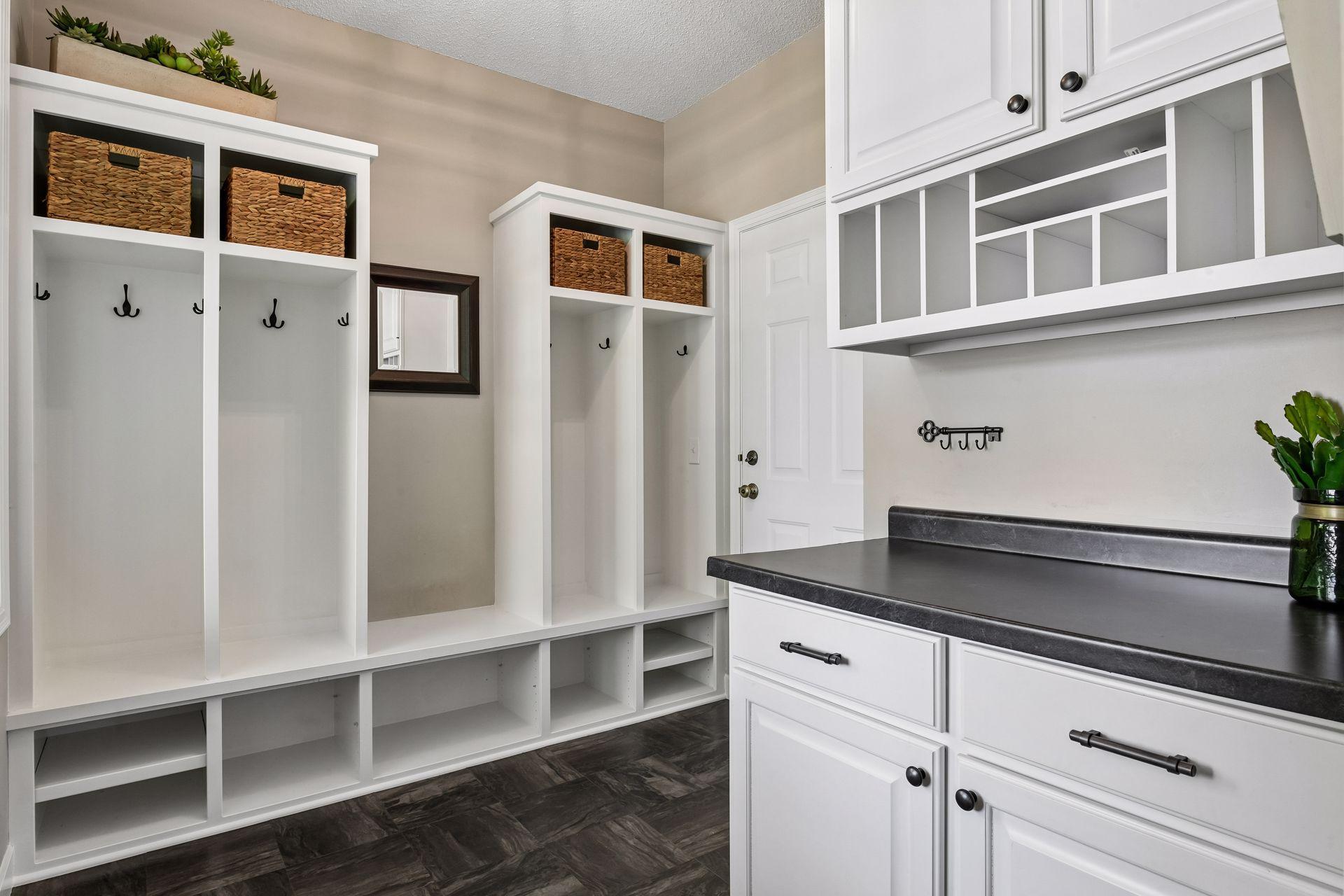 Designed for the ultimate in organization! The Mud Room features built-in lockers and a handy Drop Station.