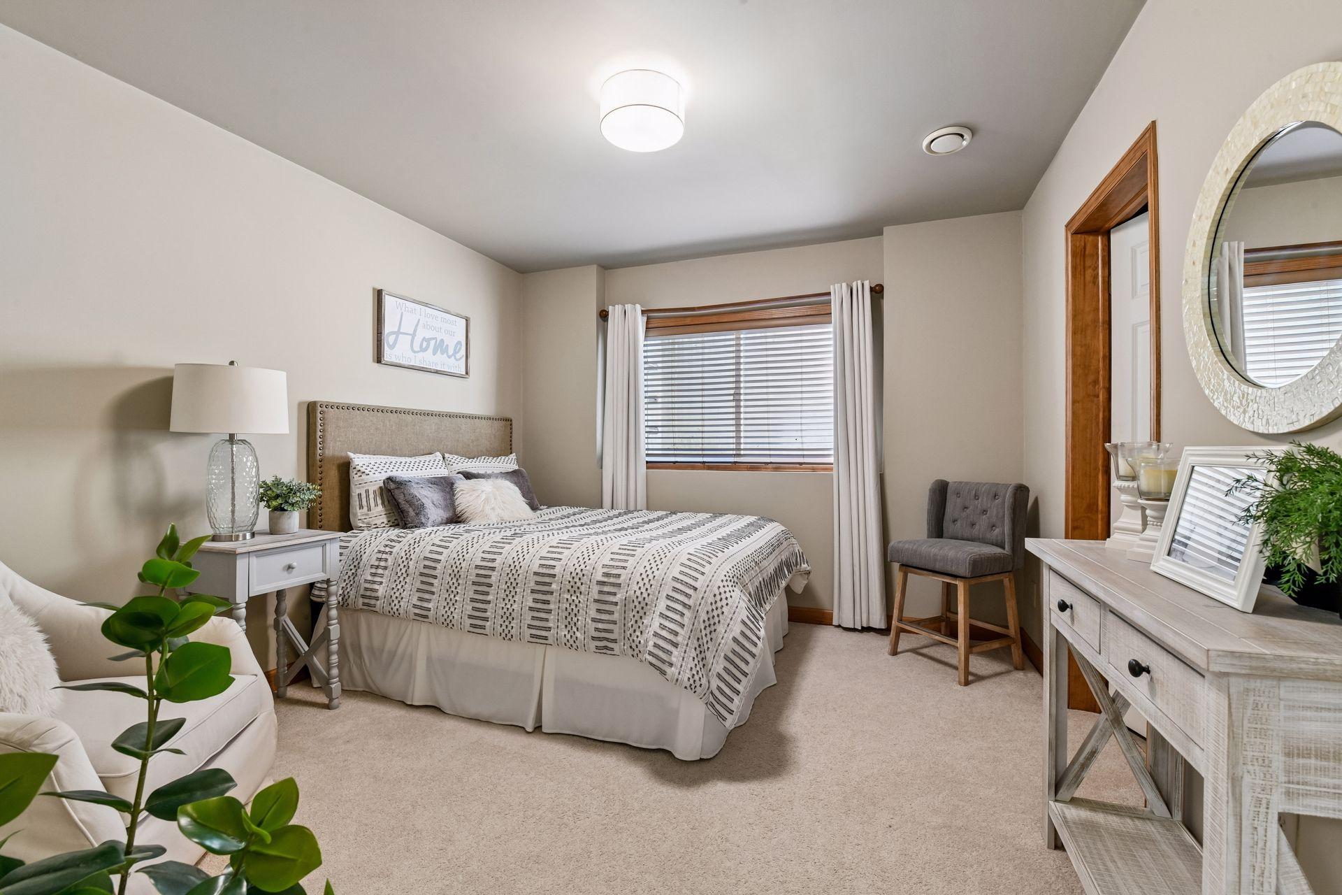 The lower level Guest Bedroom is ideal for overnight visitors. A bathroom has been roughed in and is ready for your finishing touches.