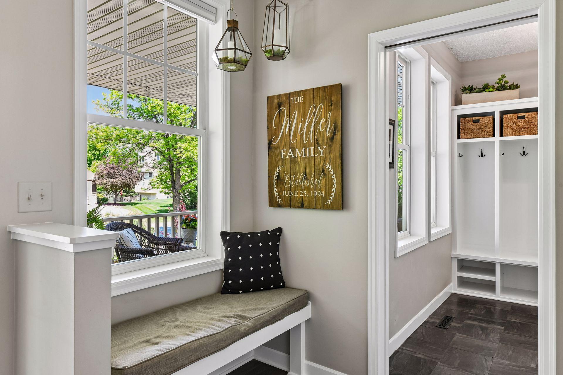 A built-in bench offers a comfortable place to pause in the Foyer.