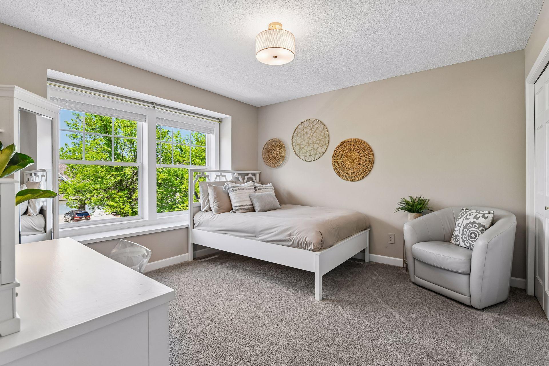 In addition to the Primary Suite, there are two Junior Bedrooms on the upper level.