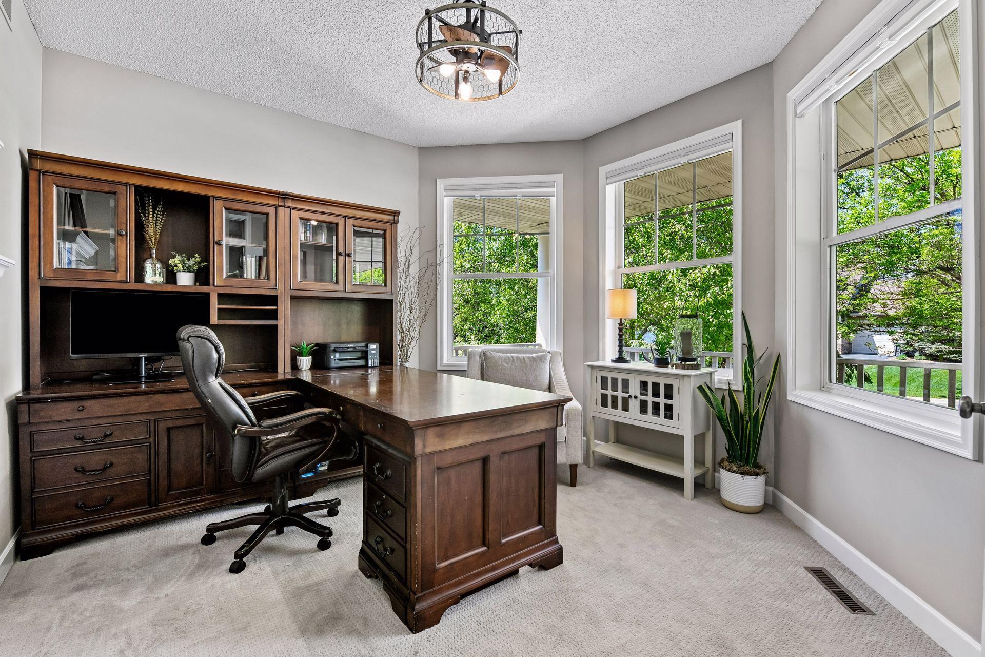 Tucked away behind a set of French doors is the main level Home Office - ideal for working from home.