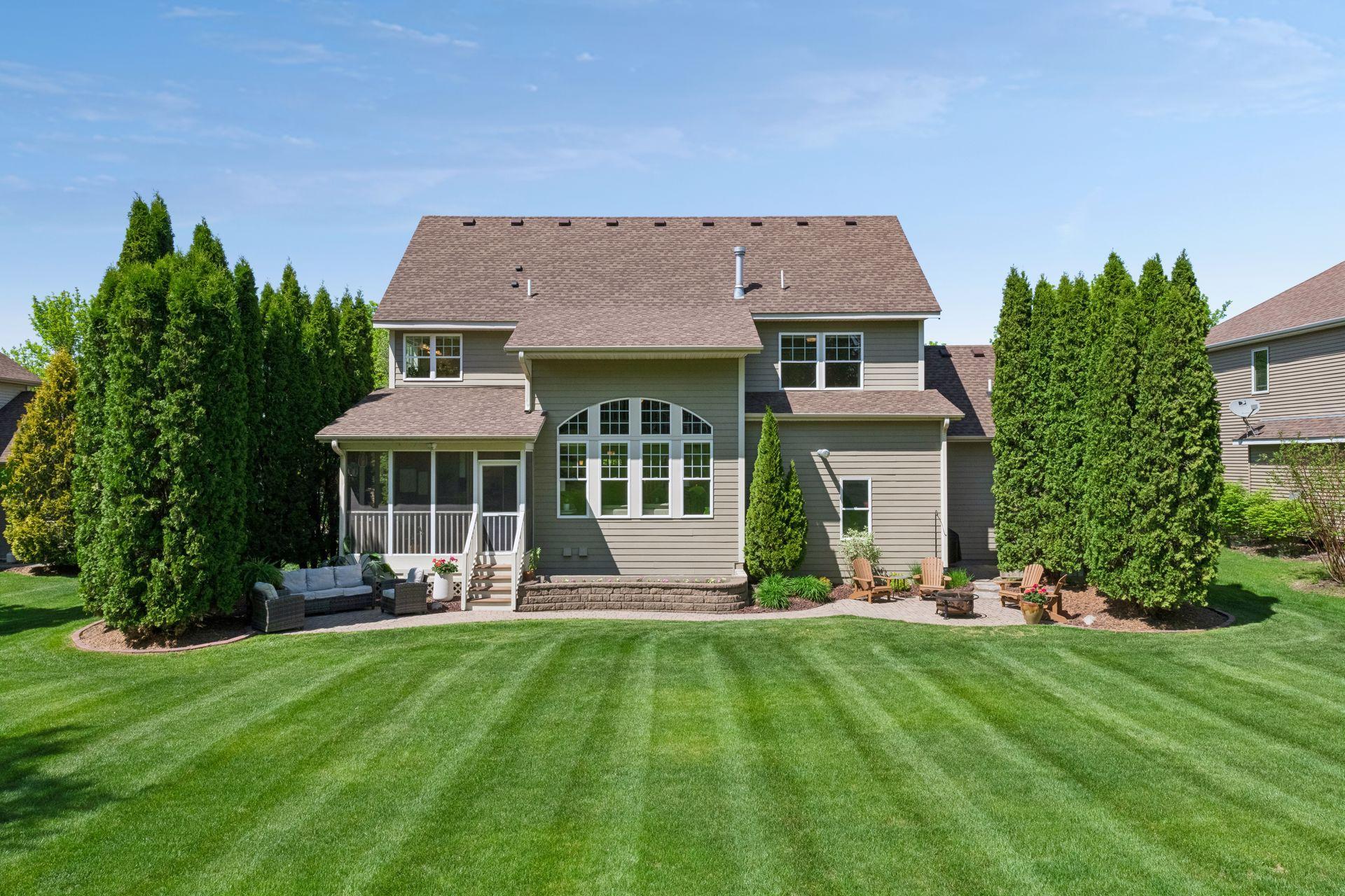 Enjoy a large, private backyard beautifully framed by mature trees.
