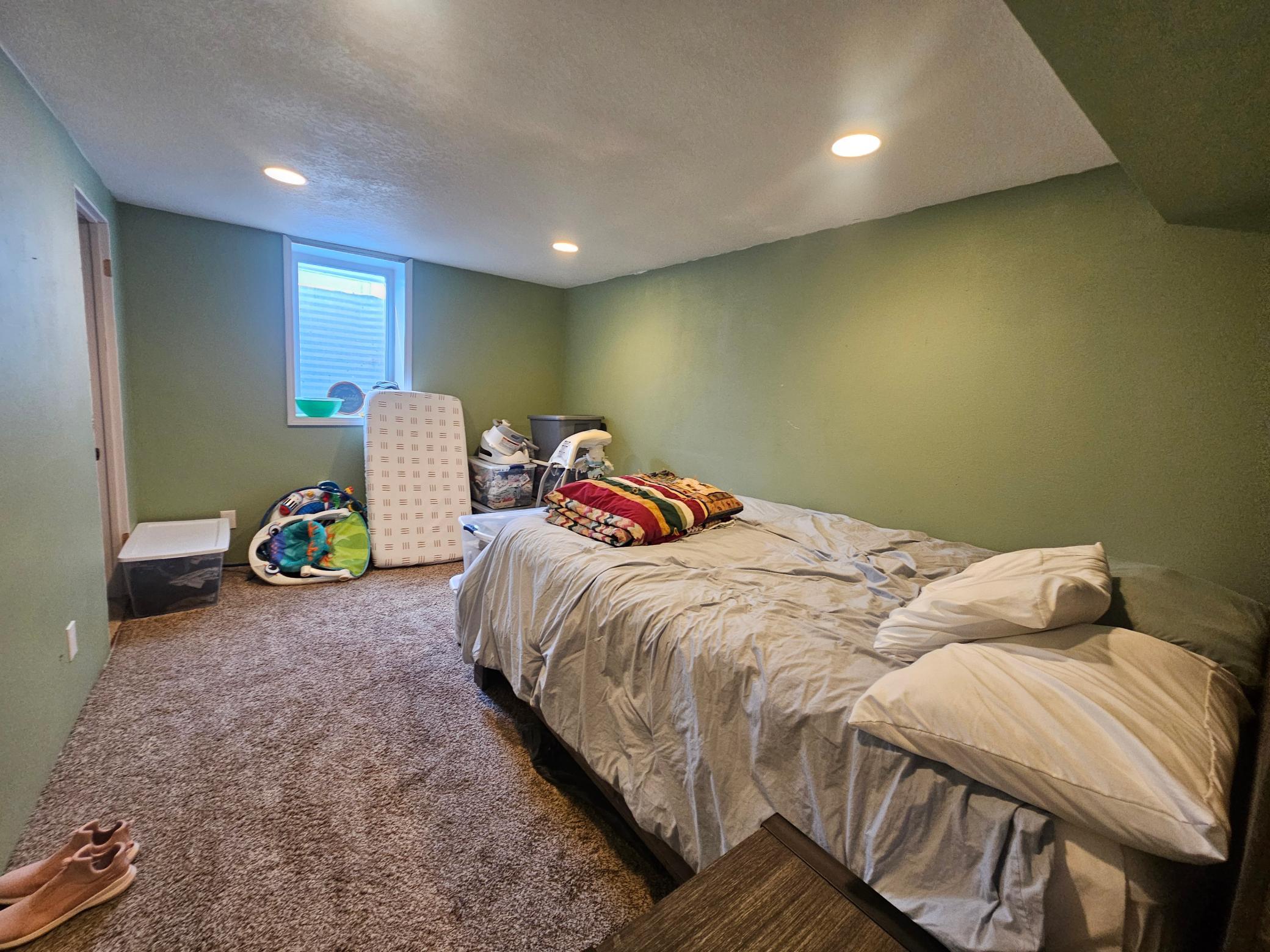 Basement bedroom with egress window