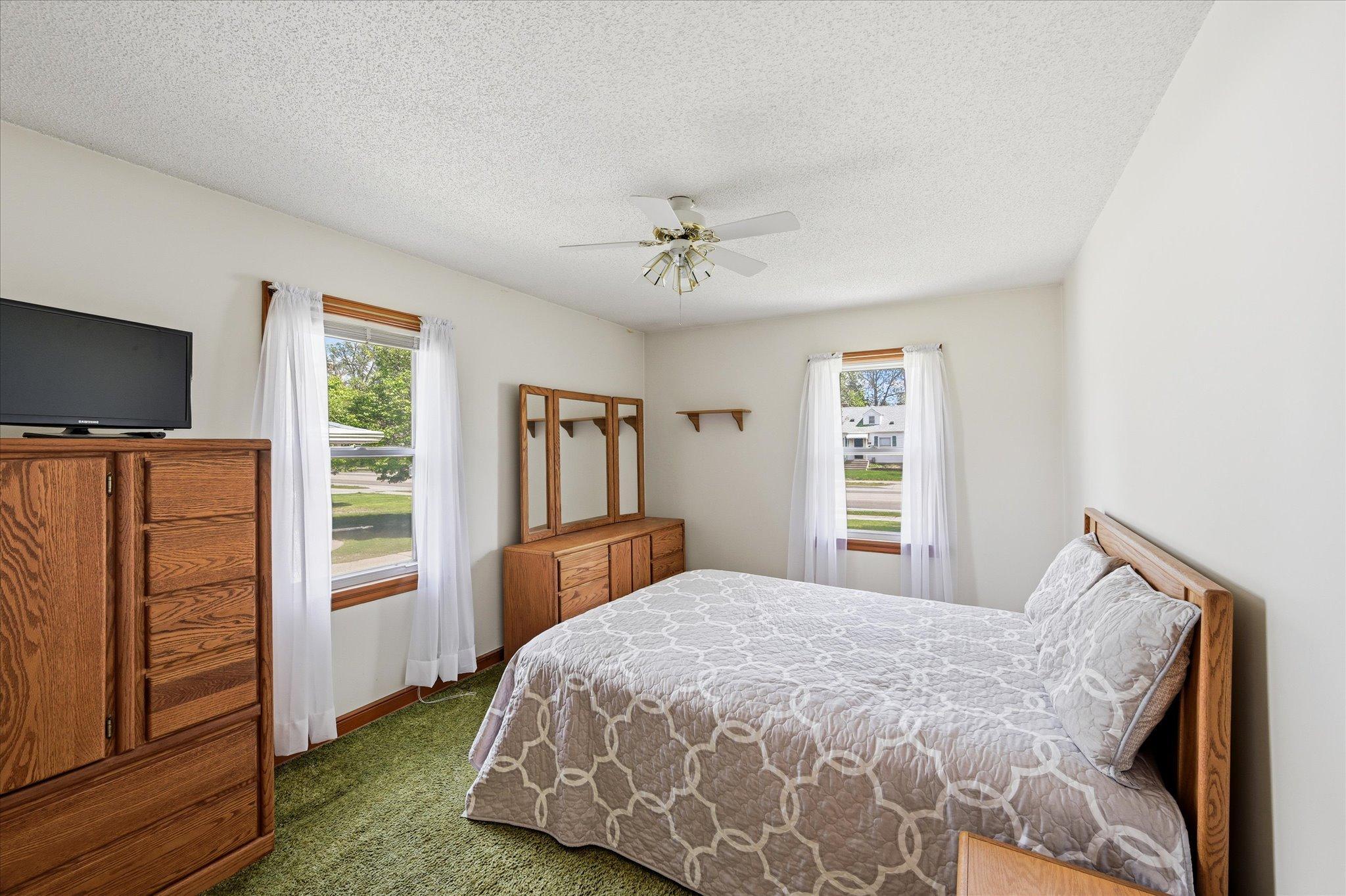 Spacious primary bedroom with walk in closet