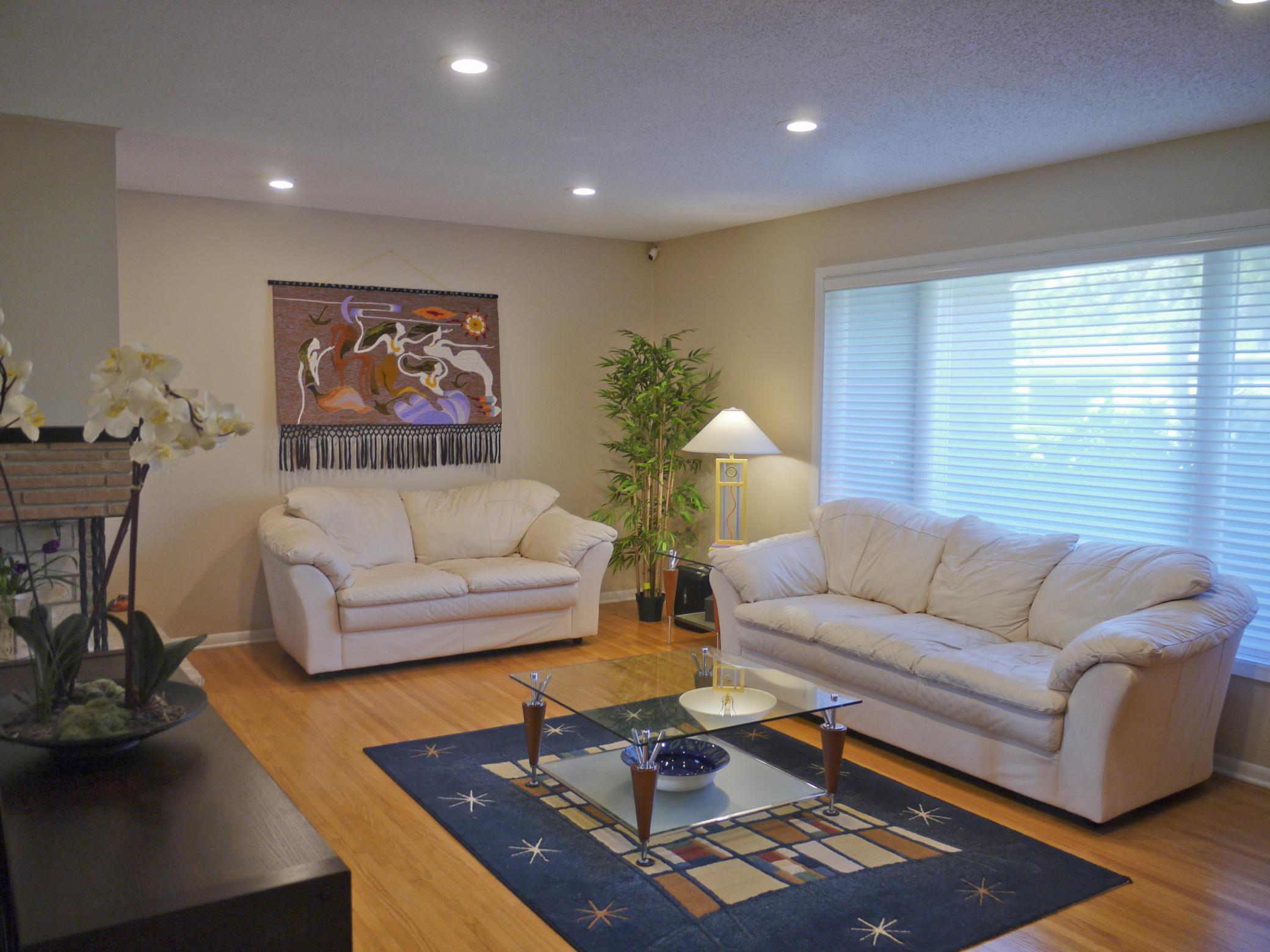 4 View of living room showing seating area and picture window.jpg