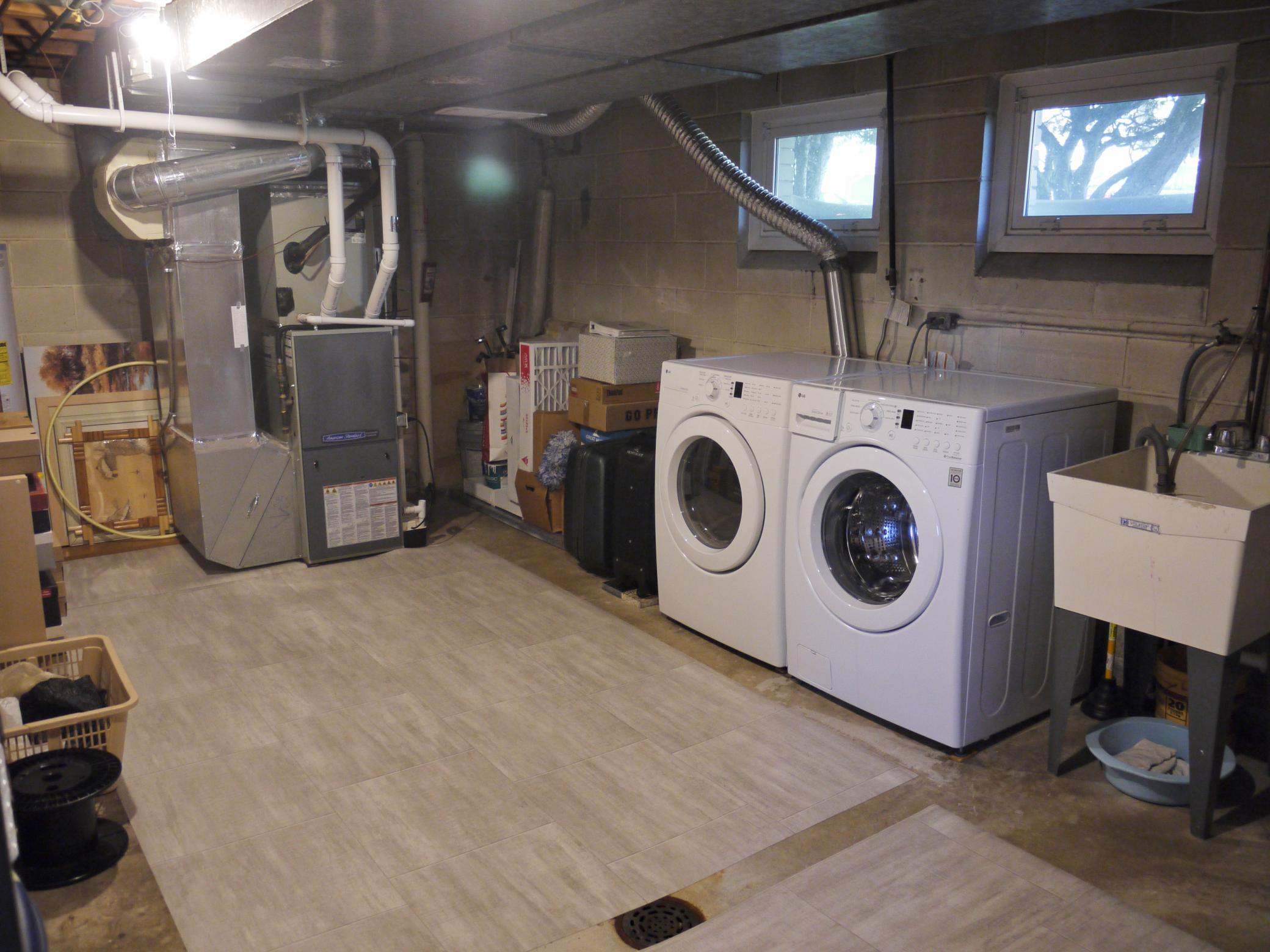 Utility and laundry with new, high efficiency furnace and ample space for laundry and storage.jpg