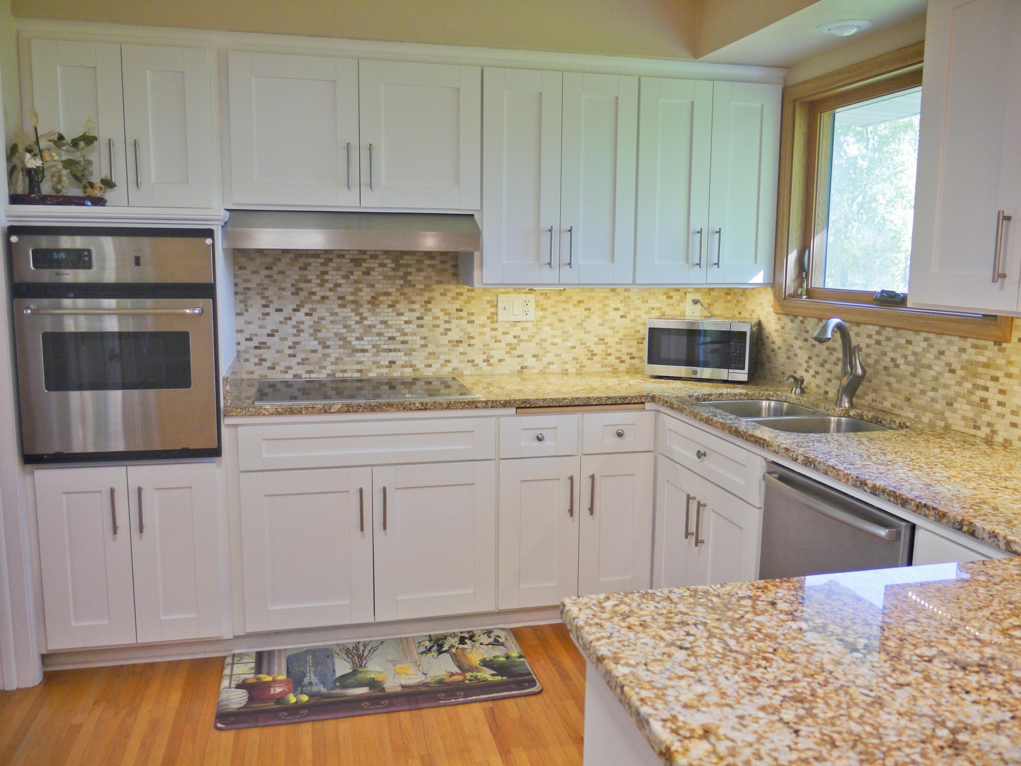 Detail of kitchen counter space showing South facing kitchen window.jpg
