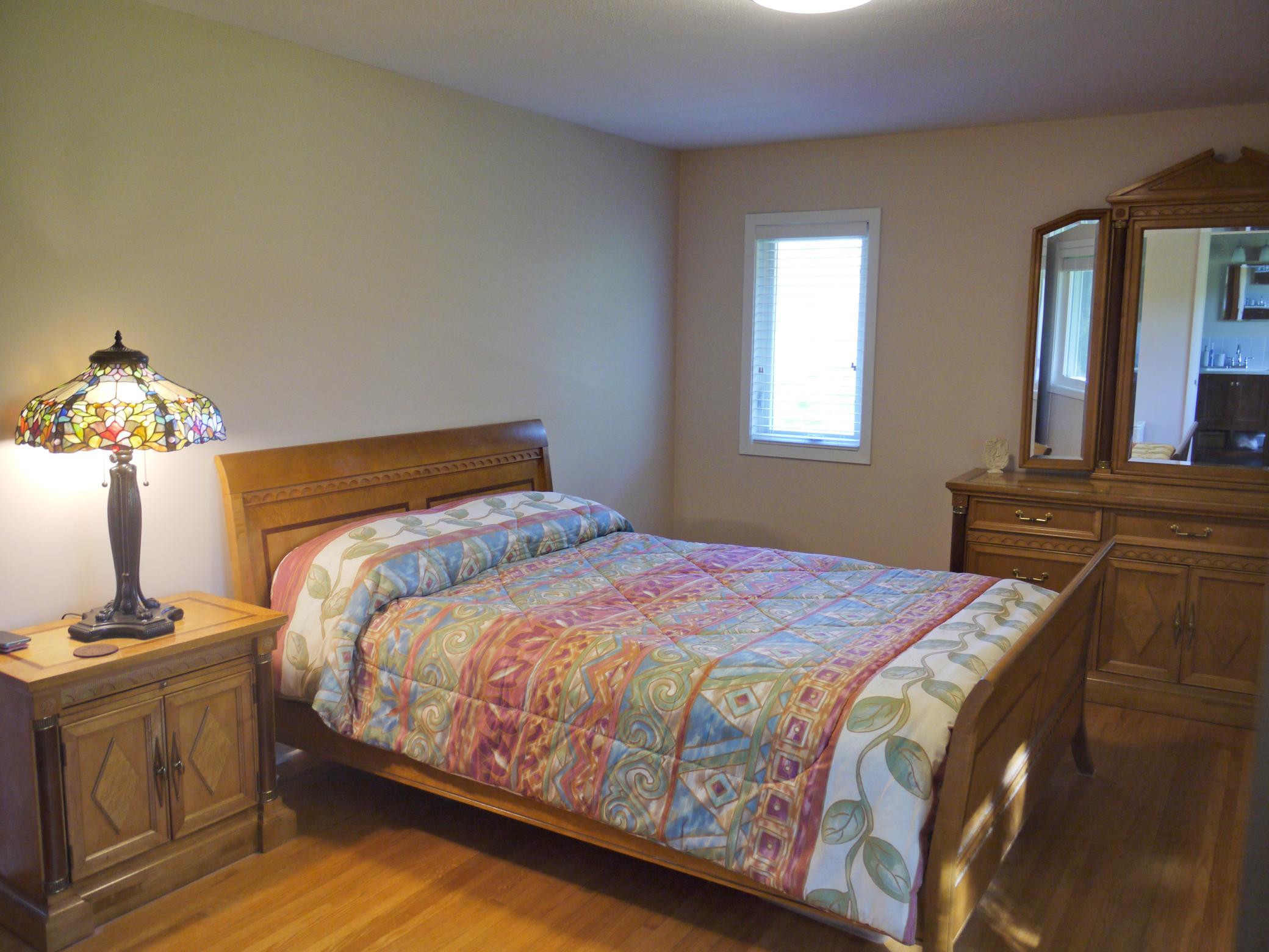 Alternate view of owners suite showing East facing window.jpg