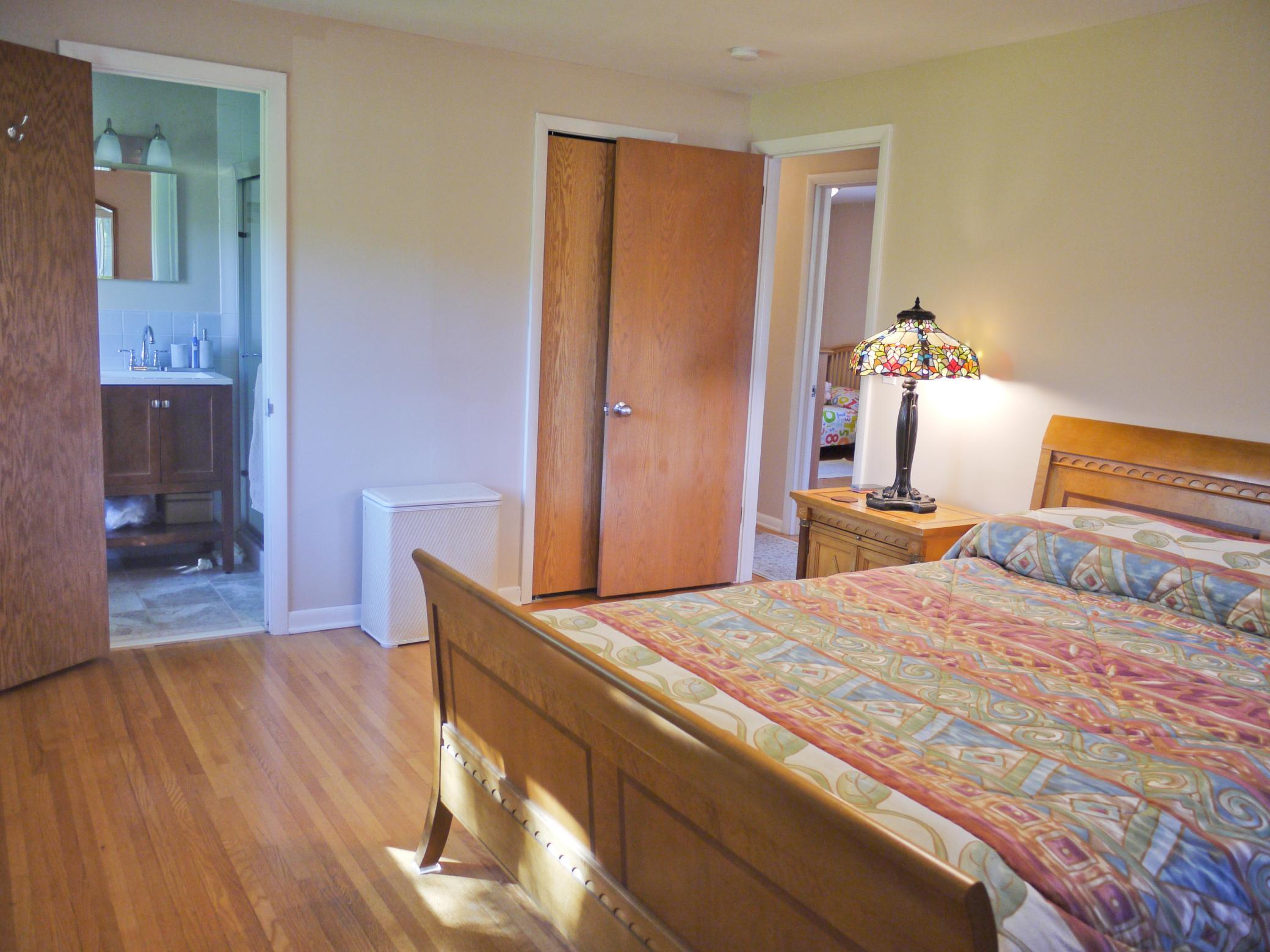 Reverse view of owners suite showing bath acces, closet and entryway.jpg