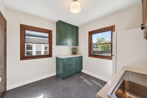 Updated kitchen, with additional new cabinet space and new flooring