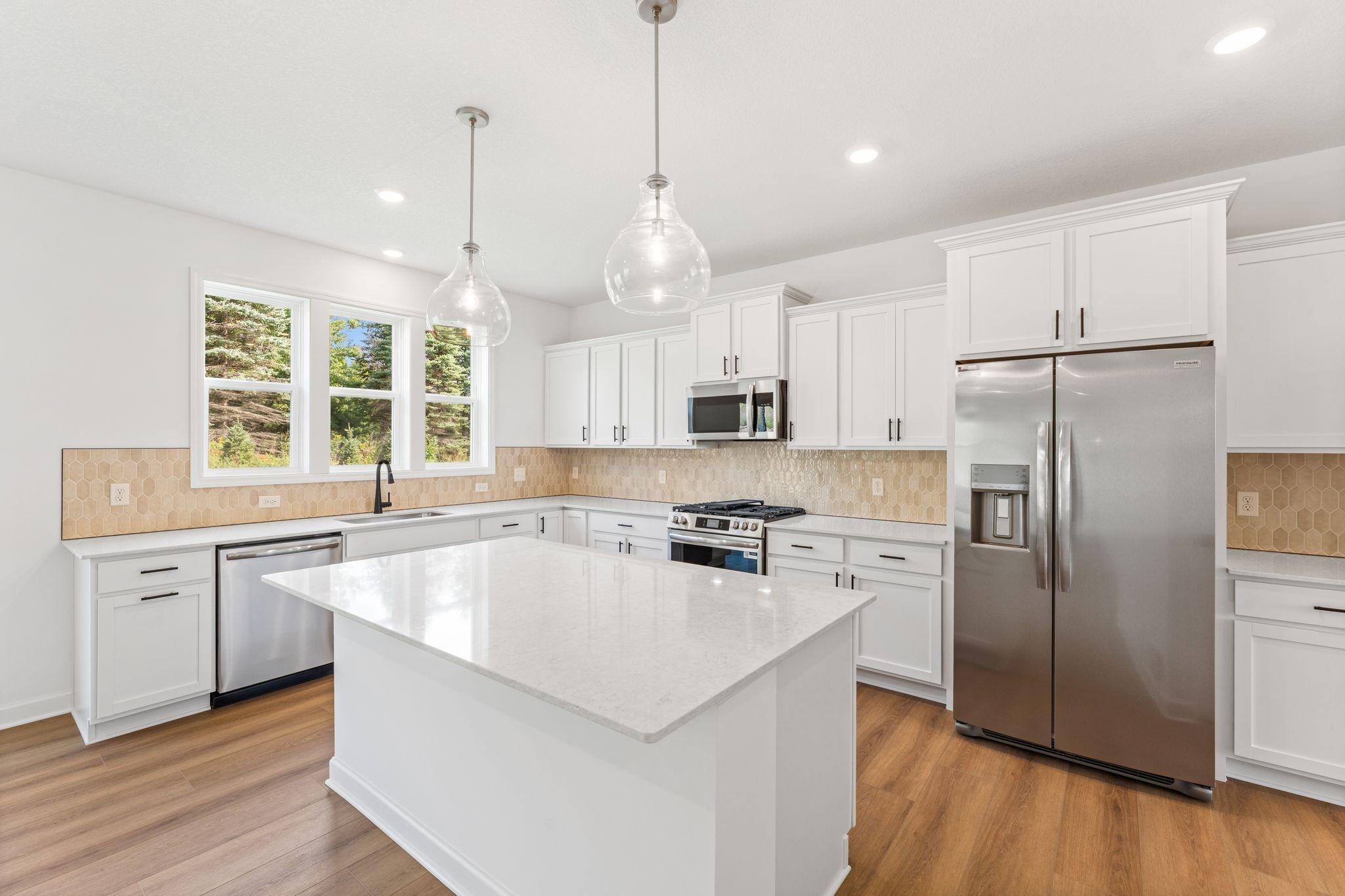 (All the following photos are of a similar home, actual finishes may vary.)