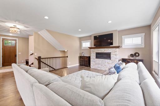 Generous living room area ideal for relaxing or watching TV