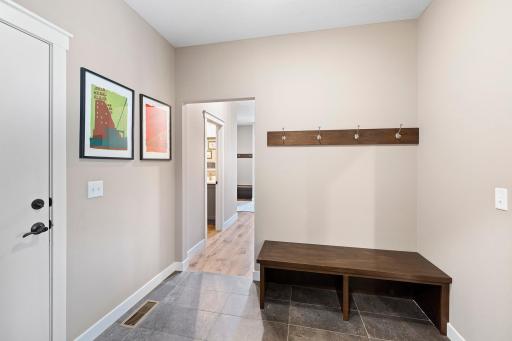 Mudroom off garage keeps the home nice and tidy during winter months