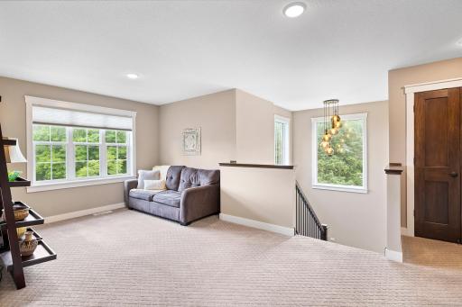 Lofted family room at the top of the stairs