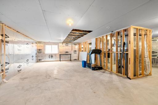Lower level is roughed in for another bathroom and bedroom with almost 1300 additional finishable square feet