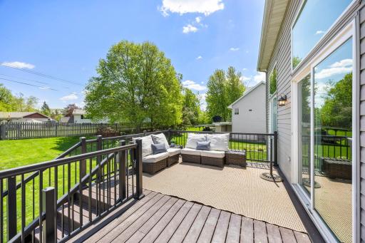 Maintenance-free deck flows directly from the main level for seamless indoor-outdoor access.