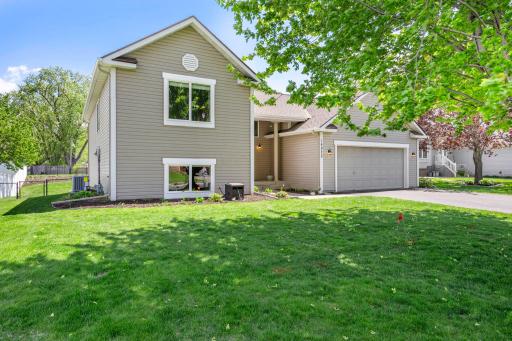 Welcome to this beautifully maintained 4-bedroom, 2-bathroom home in Rosemount