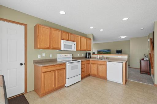 Nice size kitchen with a door to the attached garage.