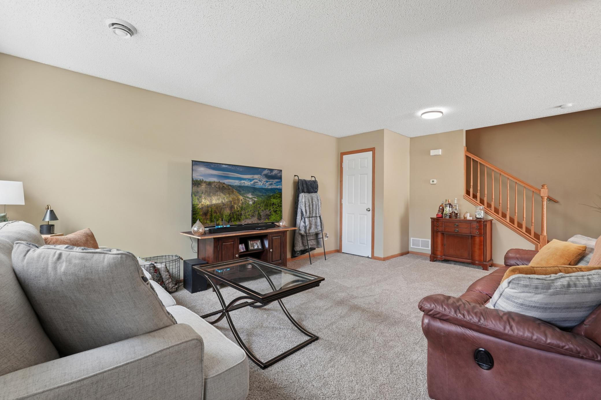 The living area offers space for a dinning table as well as a coat closet.