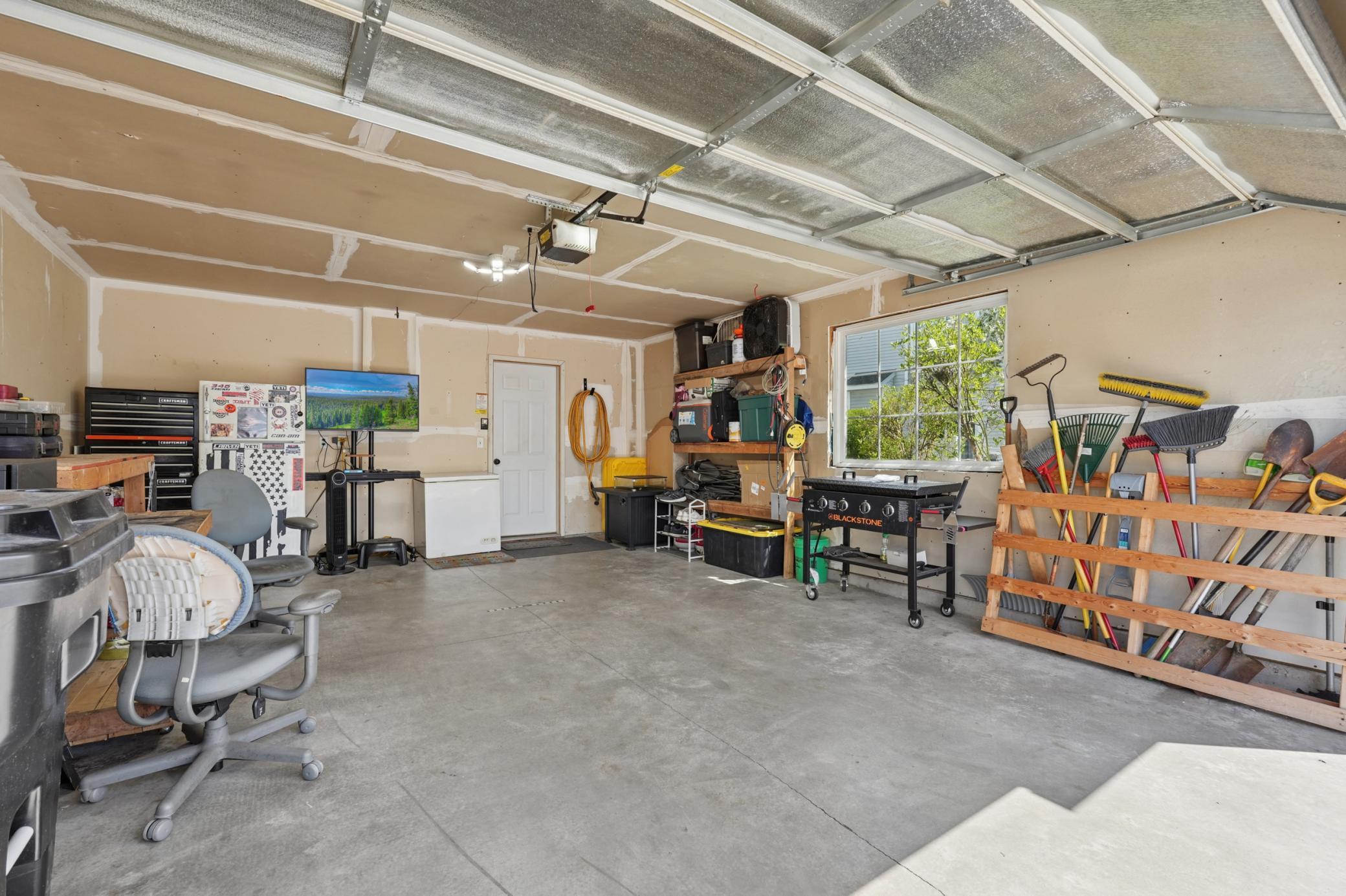 2 car attached garage with picture window