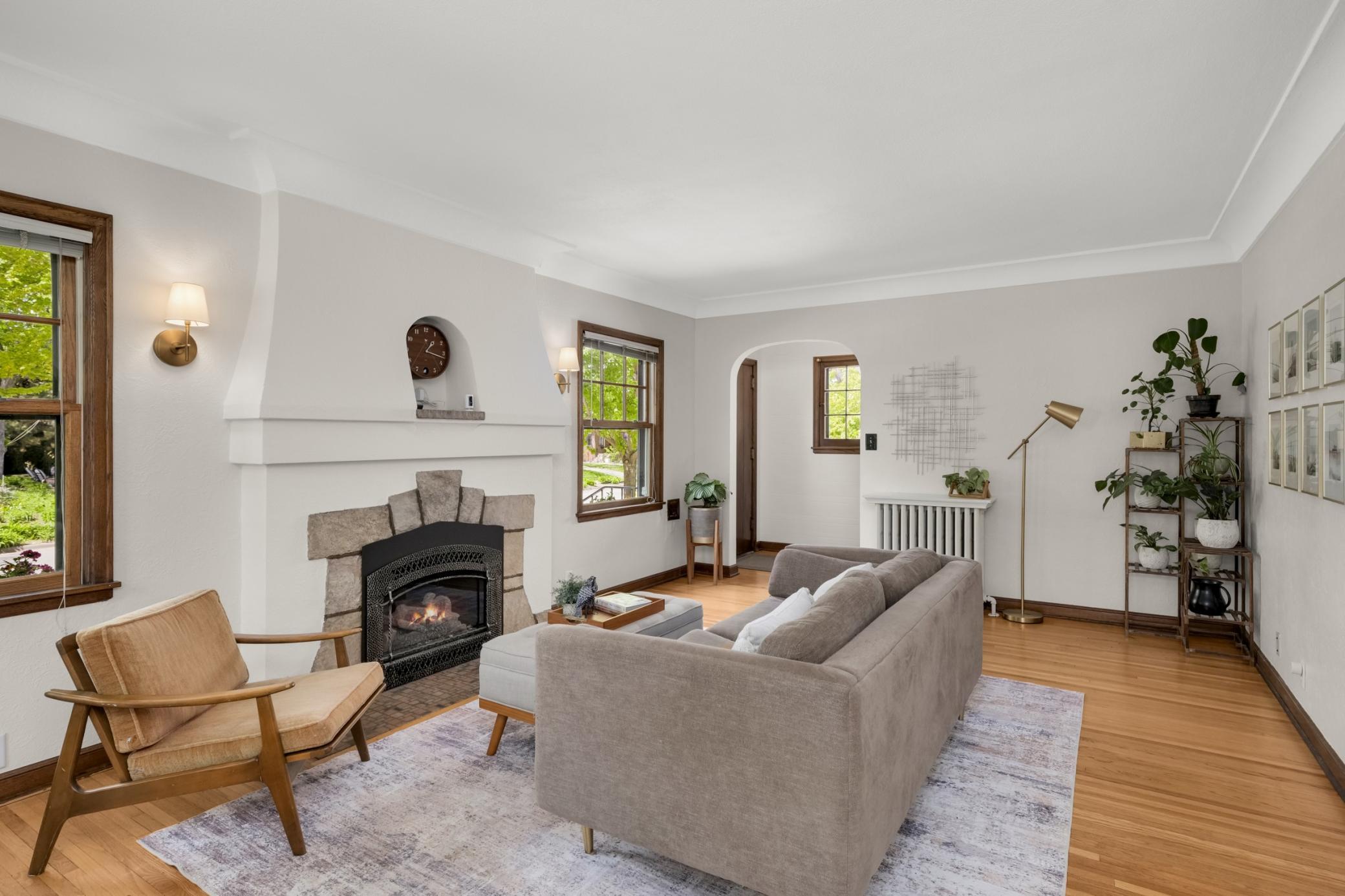 Plaster and stone fireplace