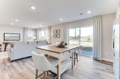 Enjoy the natural light in your truly open living space. (Model photo, colors may vary)