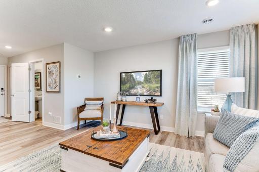Every home is an end unit, which means more windows and light. (Model photo, colors may vary)