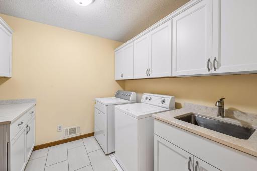 Convenient upper-level laundry, 1 of 2 laundry rooms in this house