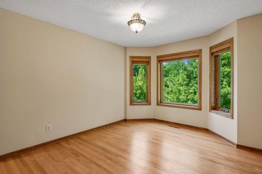 Super space with bow window overlooking the lovely backyard