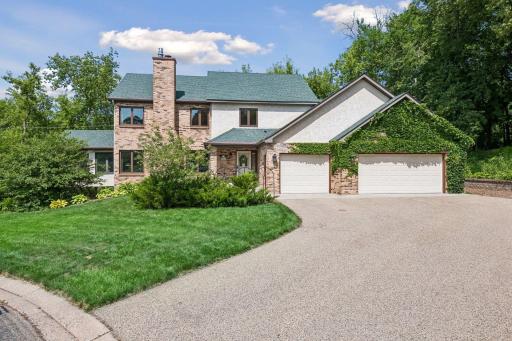 Convenient 3 car garage with wheel chair ramp