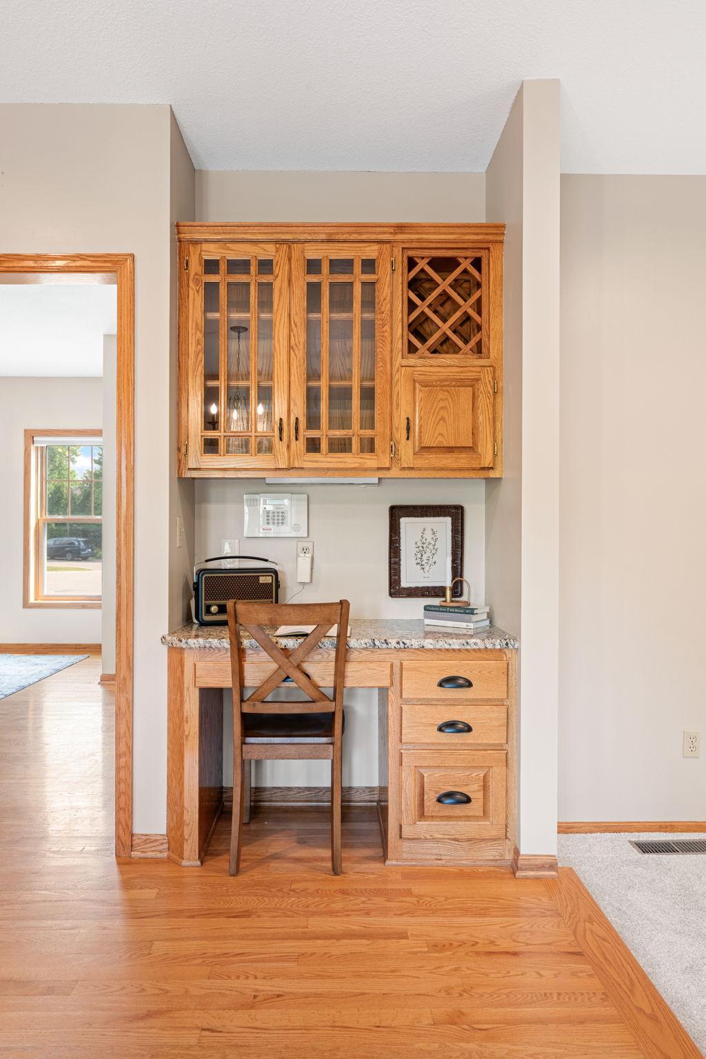 Built-in desk area offers additional storage in the kitchen!