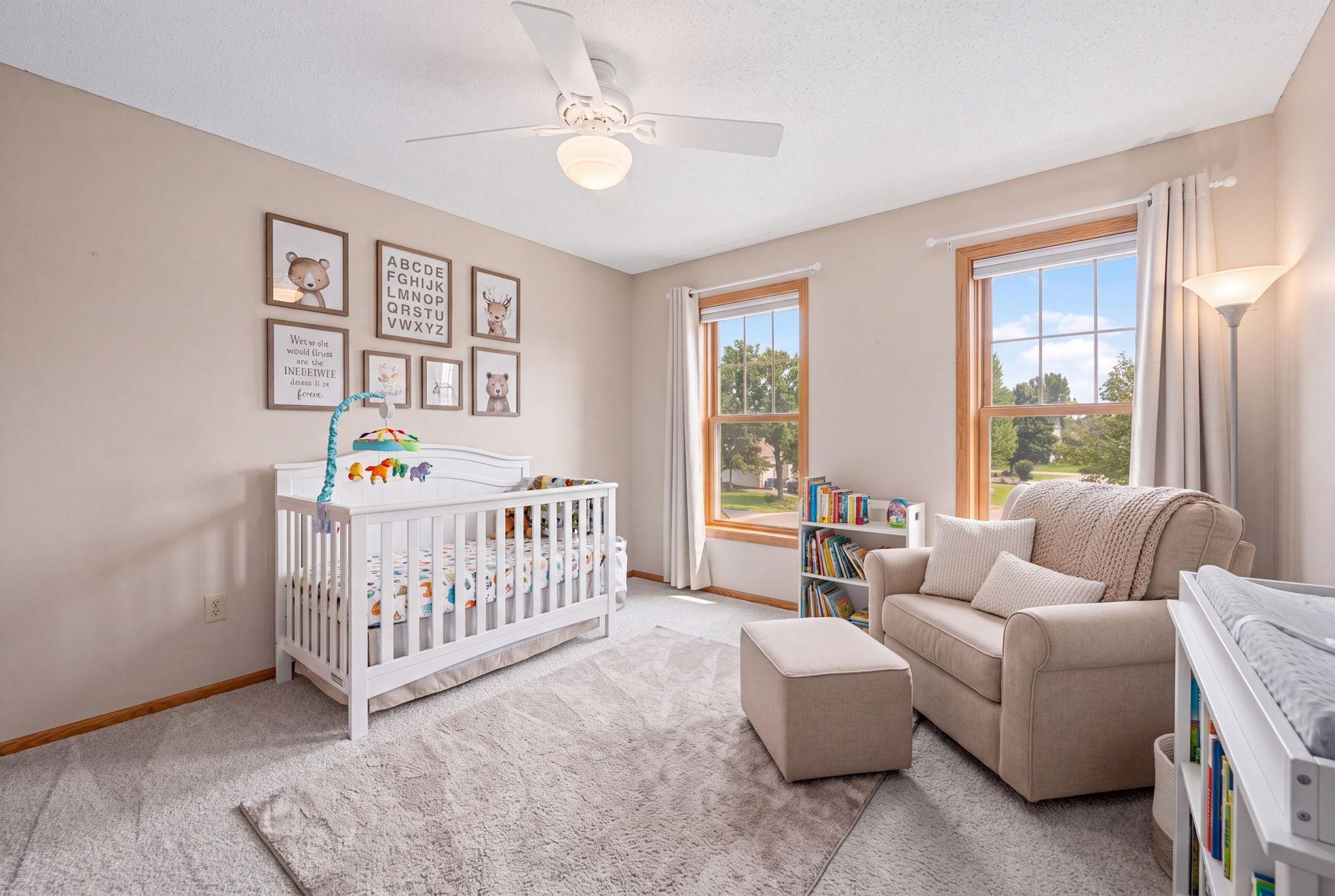Virtually staged upper level bedroom.