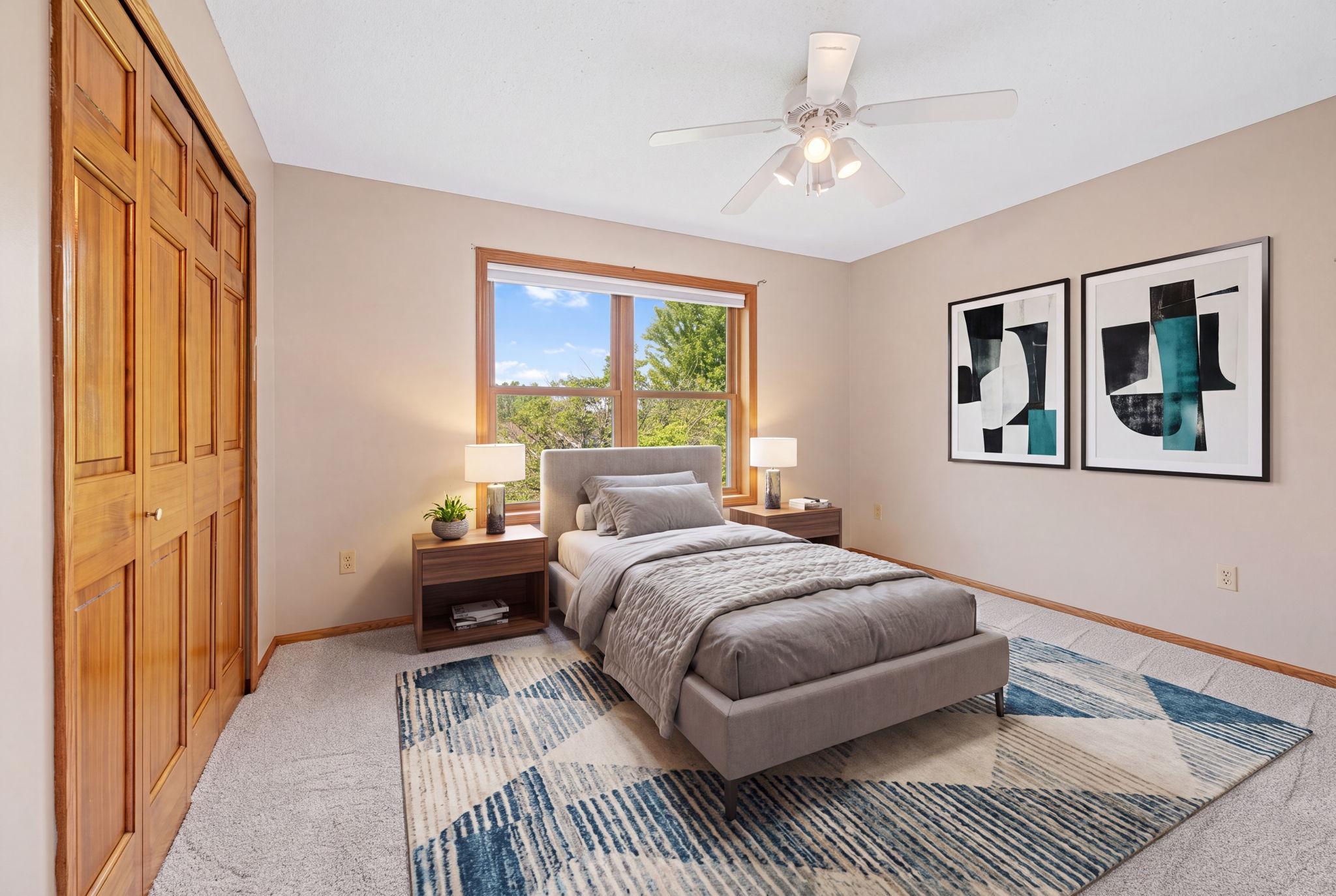 Virtually staged upper level bedroom.