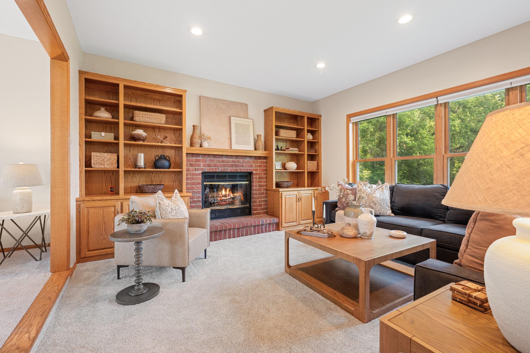 Cozy up next to the brick fireplace in the family room.
