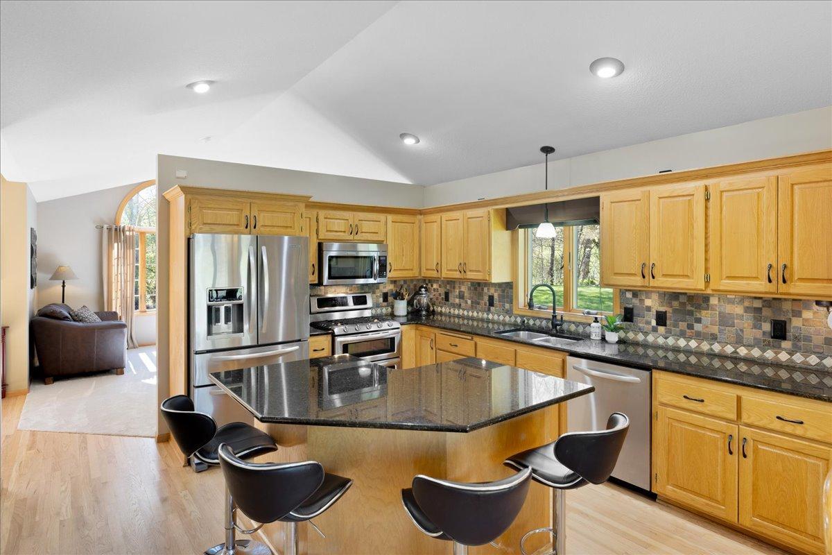 Vaulted kitchen with center island