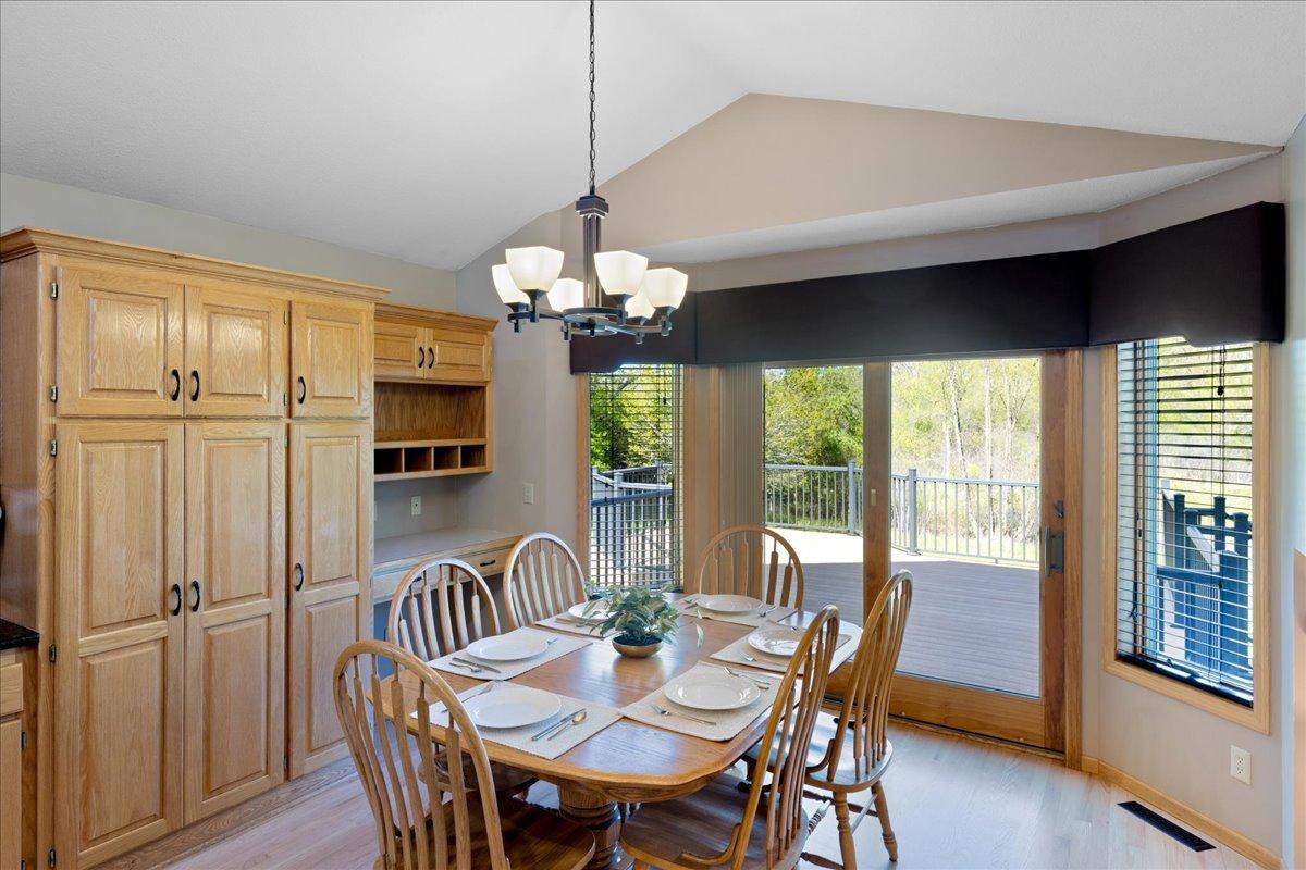 Dining Area Overlooking Scenic Backyard Views