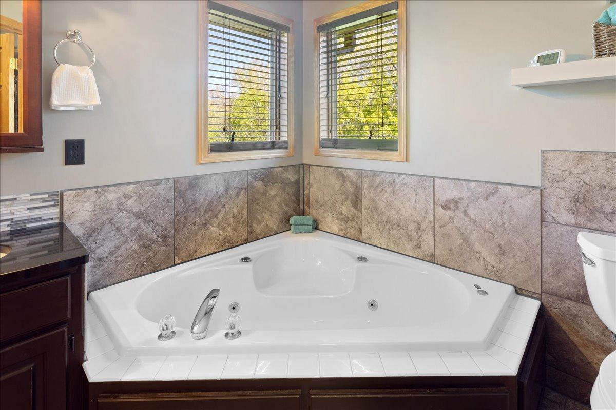 Corner Whirlpool Tub with Natural Light 50-050.jpg