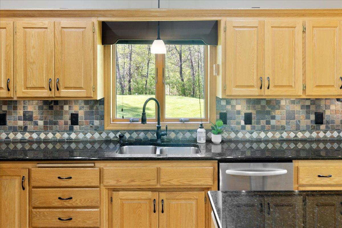 Kitchen Views of the Private Wooded Backyard 25-025.jpg