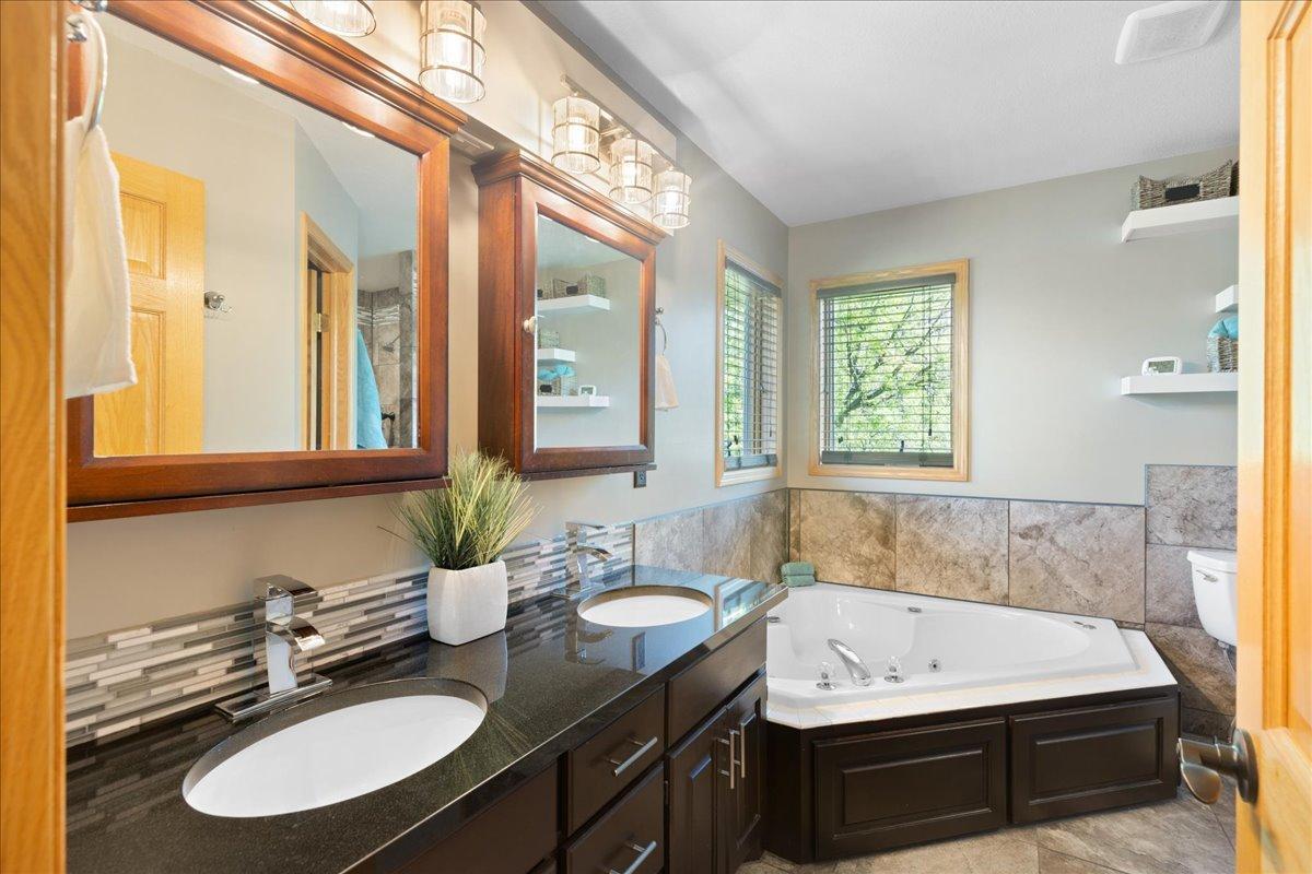 Spa Inspired Primary Bathroom with Dual Vanity 48-048.jpg