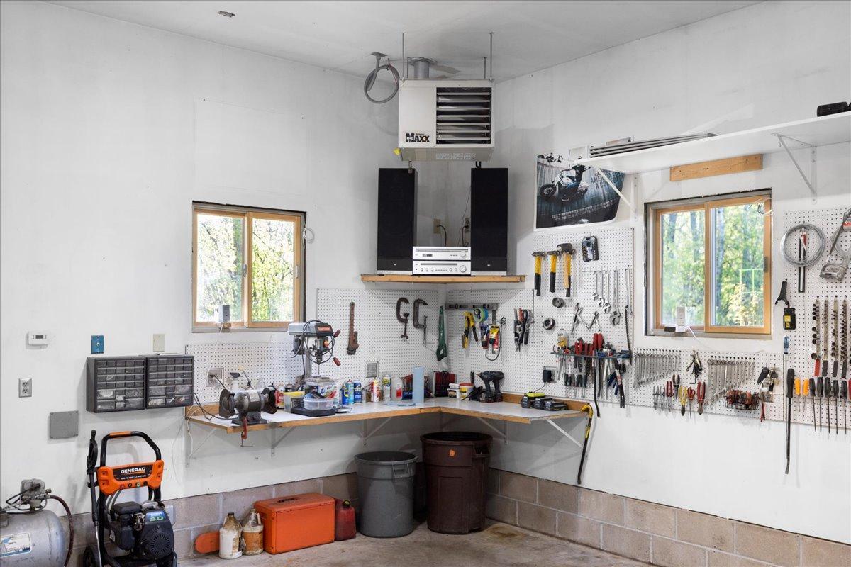 Dedicated Workshop Area with Built-In Workbenches, Heat, and Tool Storage
