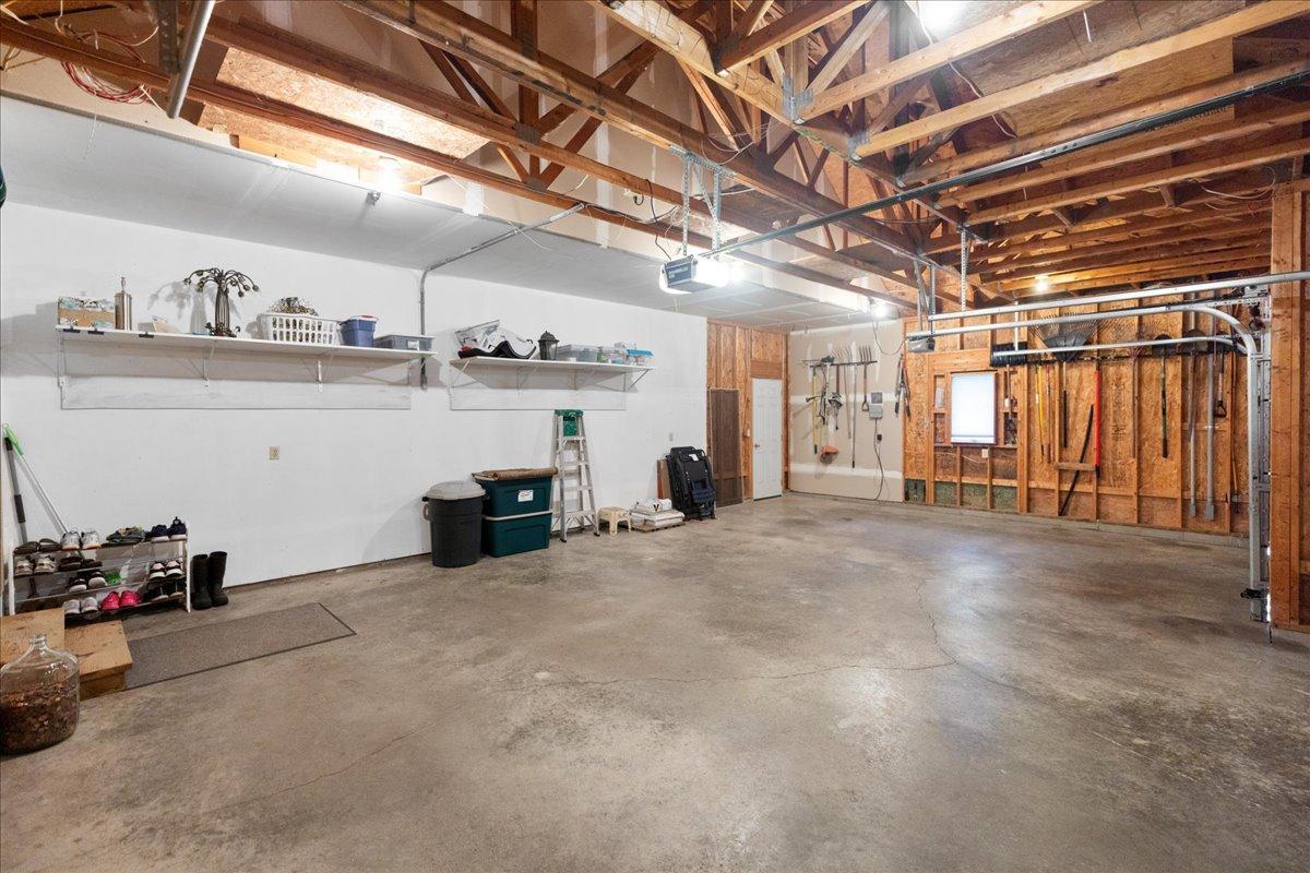 Attached 3-car garage with overhead doors
