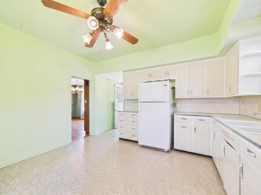 Functional kitchen ready for future updates and personal touches.